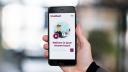 Hoodhunt mobiel interface in iemands hand met welkomstscherm